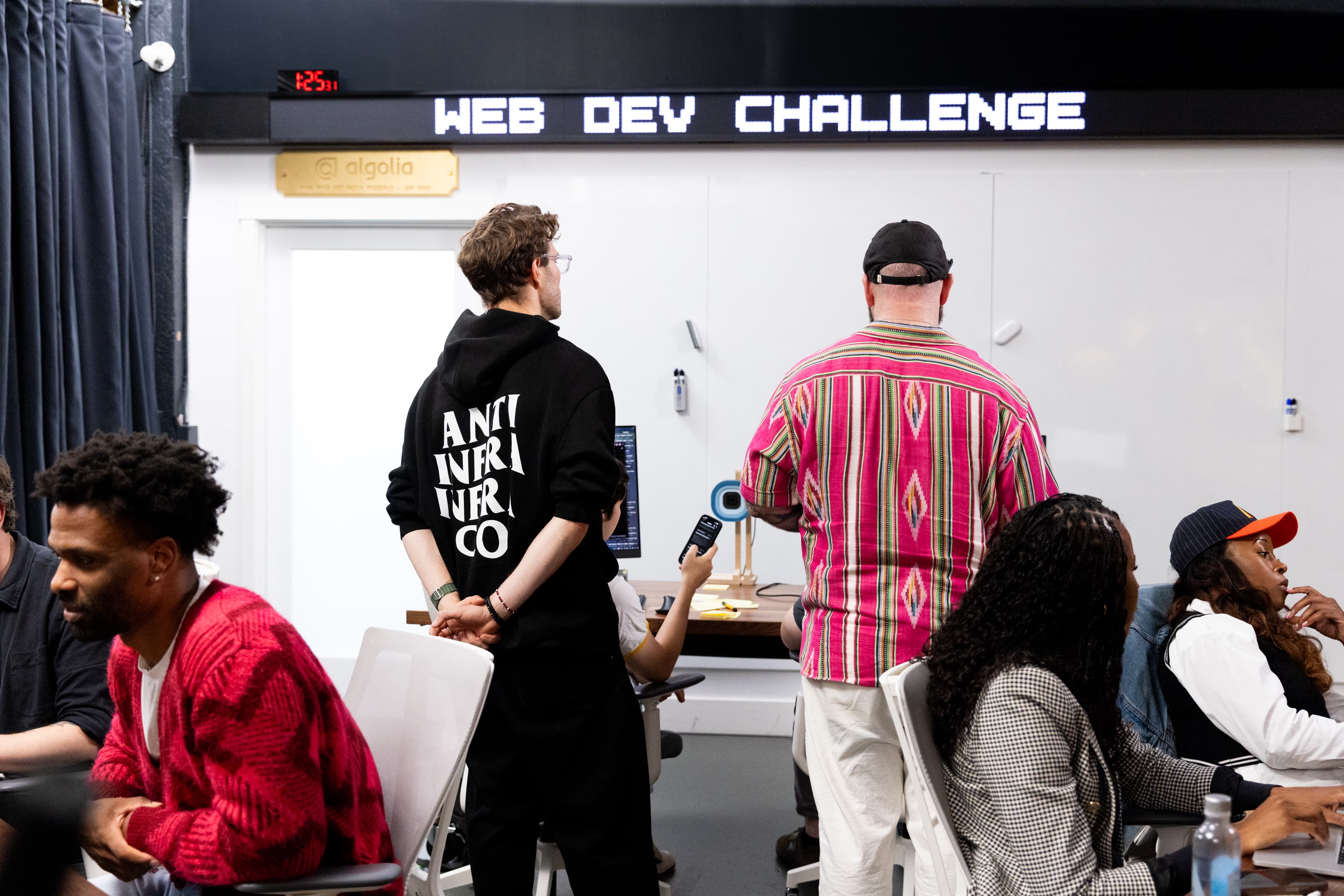 Teams watching under the Web Dev Challenge sign